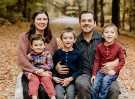 Family shot of Dave Carson, his wife, and 3 young kids